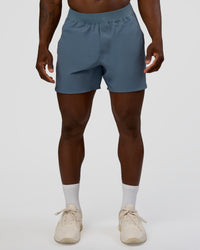 Man wearing Lift 6" Short - Blue Mirage | Model:Sam | Size:L | Thumbnail Index: 1