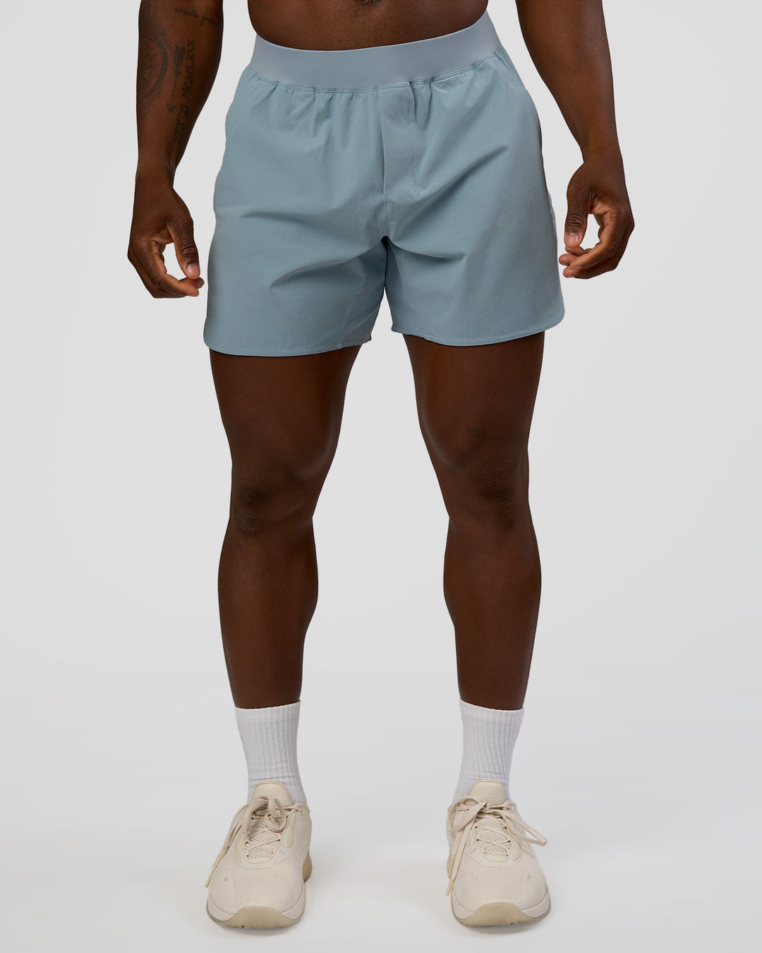 Man wearing Lift 6" Short - Dusty Blue | Model:Sam | Size:L - view 1
