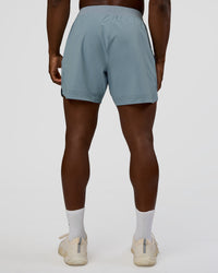 Man wearing Lift 6" Short - Dusty Blue | Model:Sam | Size:L | Thumbnail Index: 3