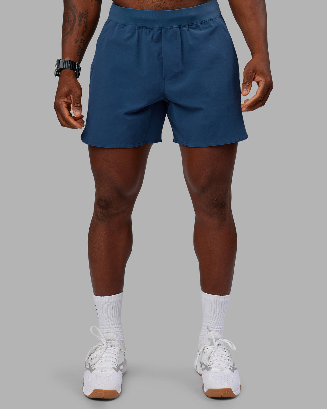 Man wearing Lift 6" Short - Indigo | Model:Sam | Size:L - view 1