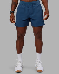 Man wearing Lift 6" Short - Indigo | Model:Sam | Size:L | Thumbnail Index: 0
