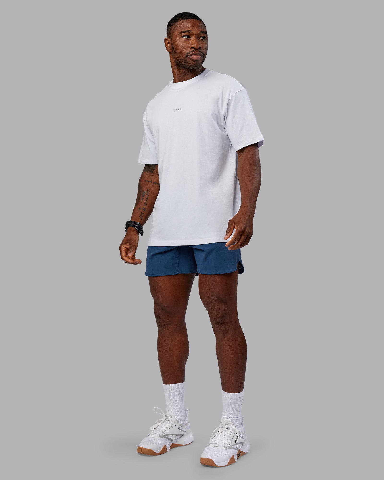 Man wearing Lift 6" Short - Indigo | Model:Sam | Size:L