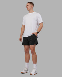 Man wearing Lift 6" Short - Pirate Black | Model:Tom | Size:L | Thumbnail Index: 7