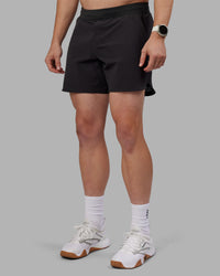 Man wearing Lift 6" Short - Pirate Black | Model:Tom | Size:L | Thumbnail Index: 0