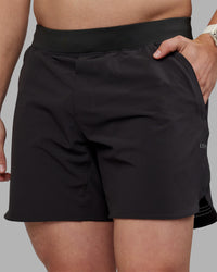 Man wearing Lift 6" Short - Pirate Black | Model:Tom | Size:L | Thumbnail Index: 2