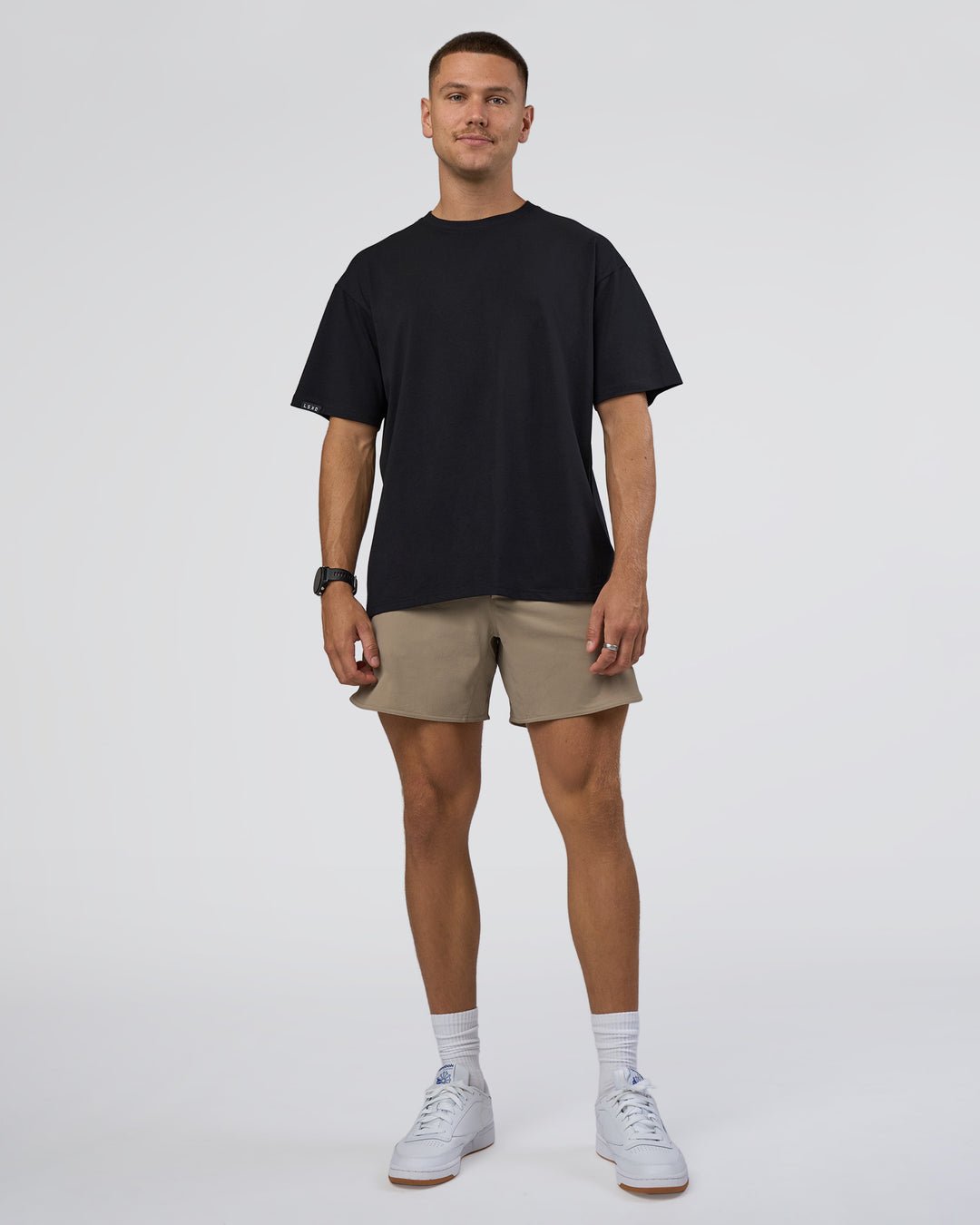 Man wearing Lifting Club FLXCotton Tee Oversize - Black-Black | Model:Nikola | Size:L - view 10