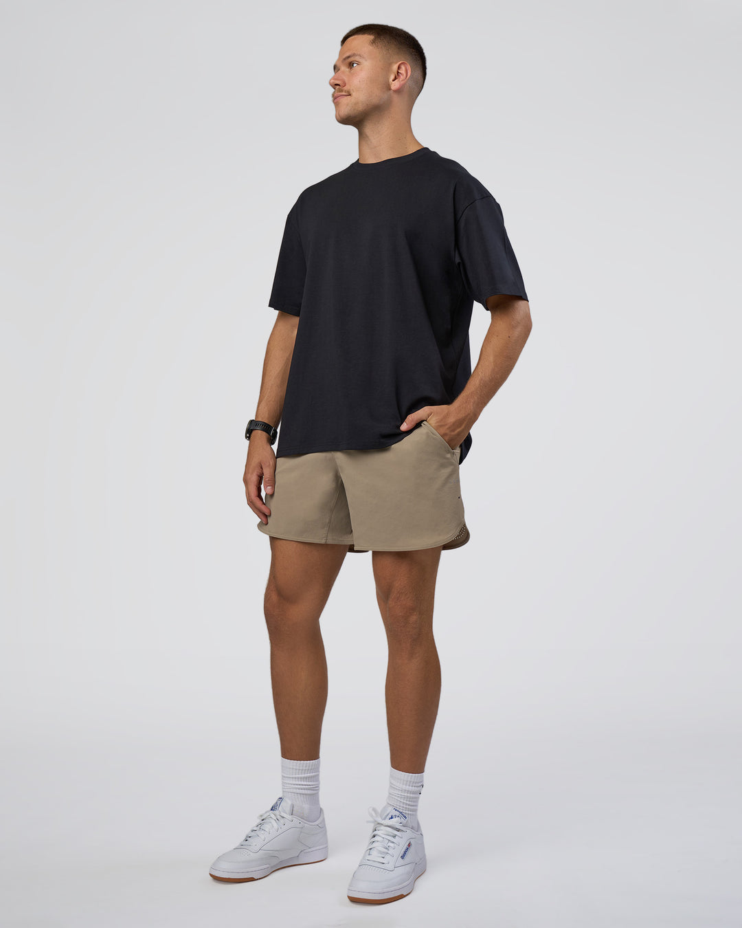 Man wearing Lifting Club FLXCotton Tee Oversize - Black-Black | Model:Nikola | Size:L - view 6