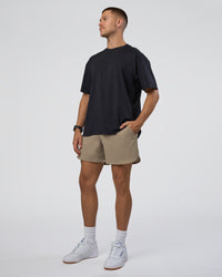 Man wearing Lifting Club FLXCotton Tee Oversize - Black-Black | Model:Nikola | Size:L | Thumbnail Index: 5