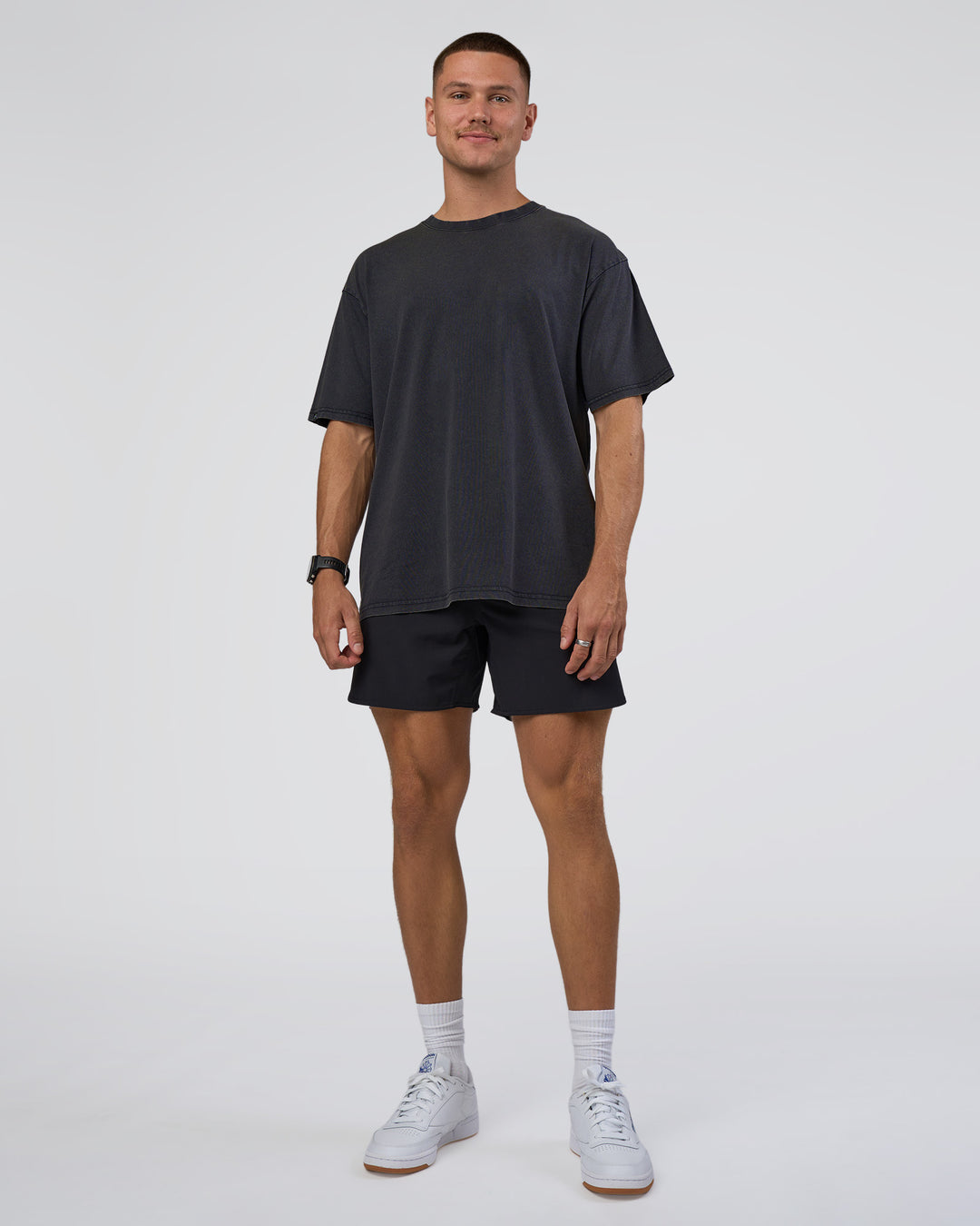 Man wearing Lifting Club FLXCotton Tee Oversize - Black Washed | Model:Nikola | Size:L - view 3