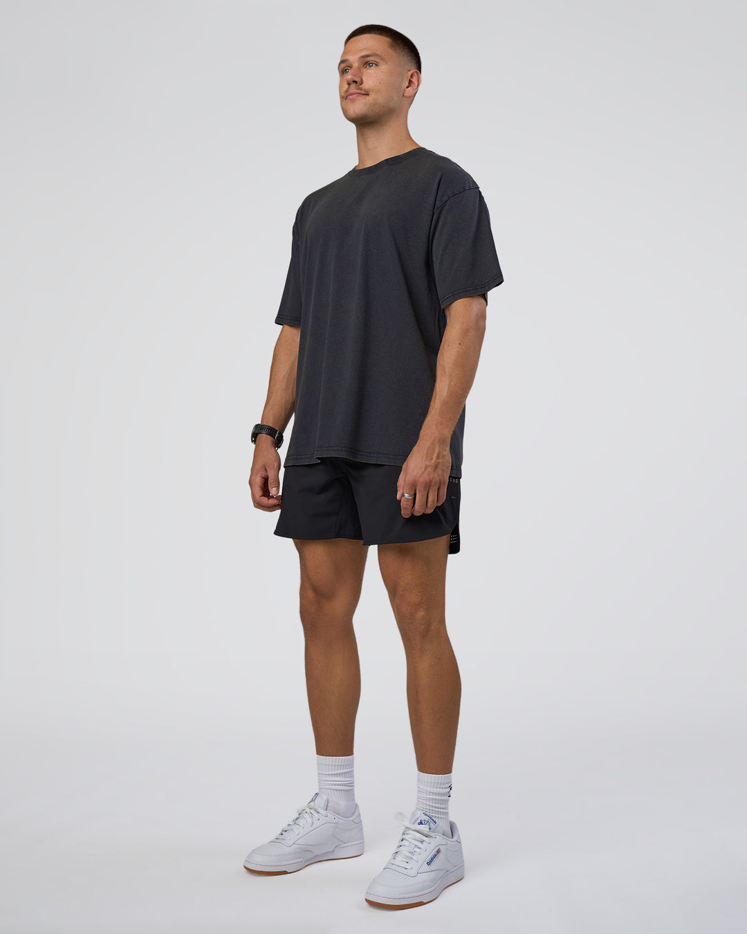Man wearing Lifting Club FLXCotton Tee Oversize - Black Washed | Model:Nikola | Size:L - view 8