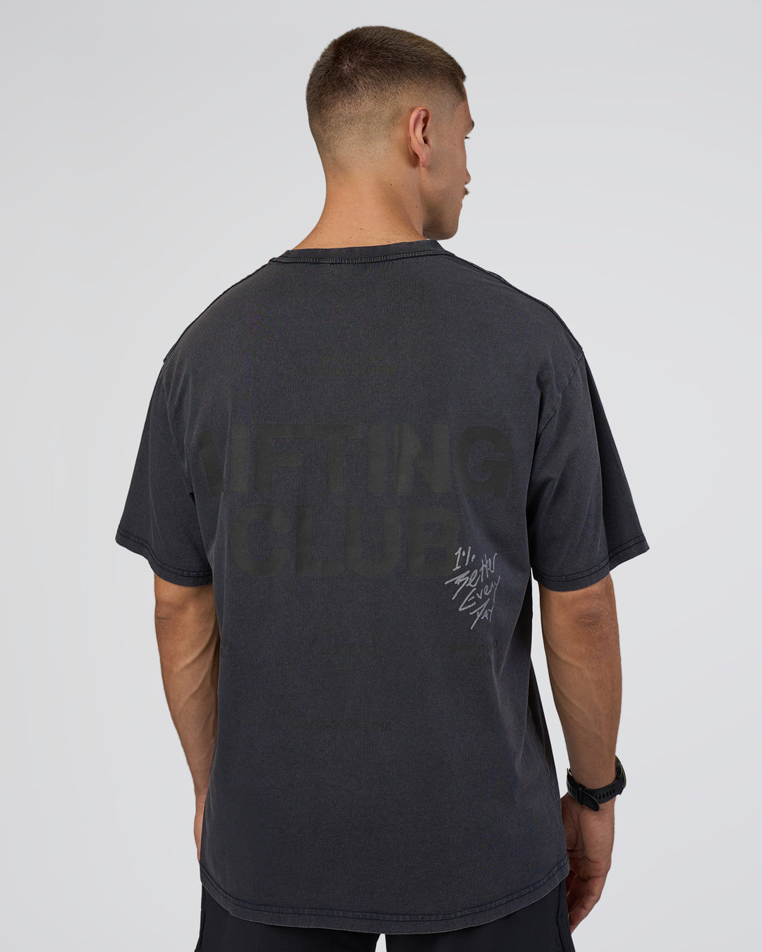Man wearing Lifting Club FLXCotton Tee Oversize - Black Washed | Model:Nikola | Size:L - view 2
