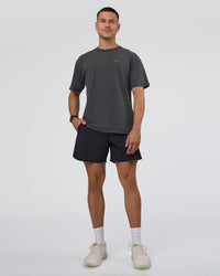 Man wearing Lifting FLXCotton Oversized Tee - Black Washed-Flame | Model:Nikola | Size:L | Thumbnail Index: 5