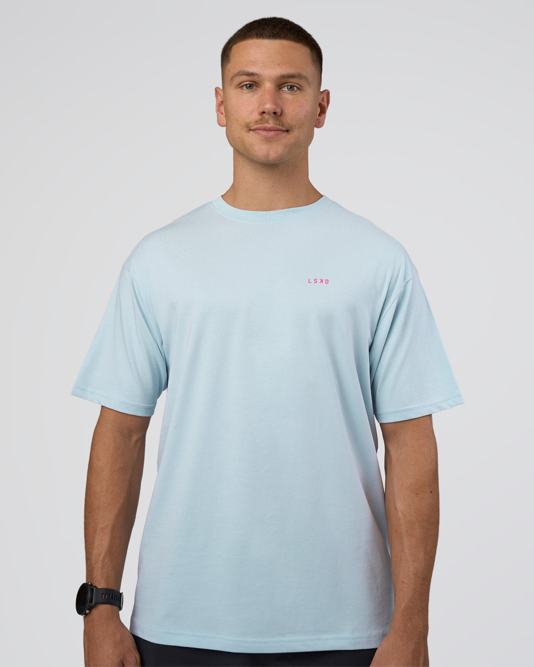 Man wearing Lifting FLXCotton Oversized Tee - Blue Aura-Ultra Pink | Model:Nikola | Size:L - view 3