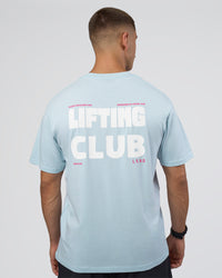 Man wearing Lifting FLXCotton Oversized Tee - Blue Aura-Ultra Pink | Model:Nikola | Size:L | Thumbnail Index: 1