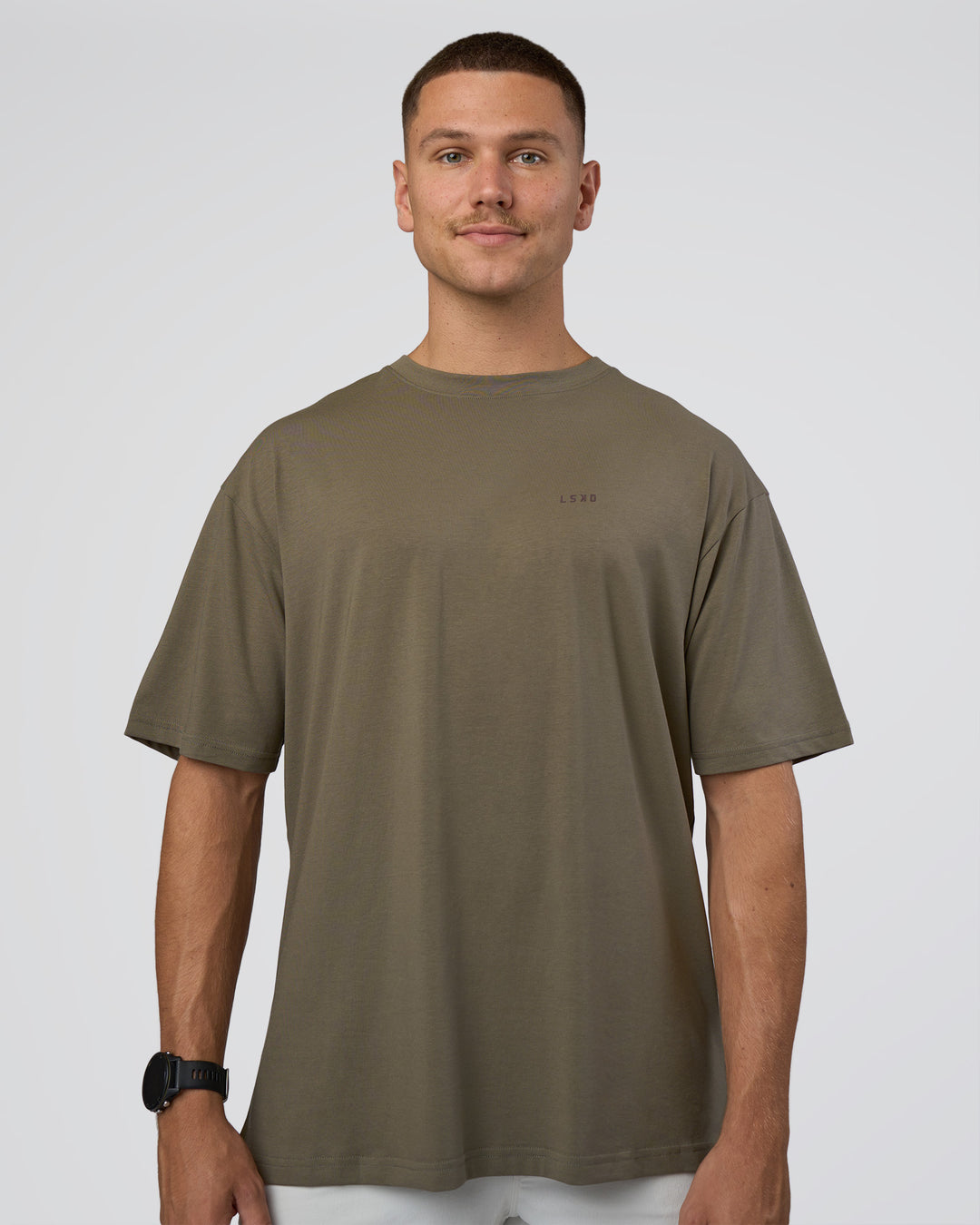 Man wearing Lifting FLXCotton Oversized Tee - Walnut Grey-Hot Chocolate | Model:Nikola | Size:L - view 2