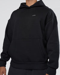 Man wearing Lifting Unisex Oversized Hoodie - Black-Flame| Model:Nikola | Size:L | Thumbnail Index: 7