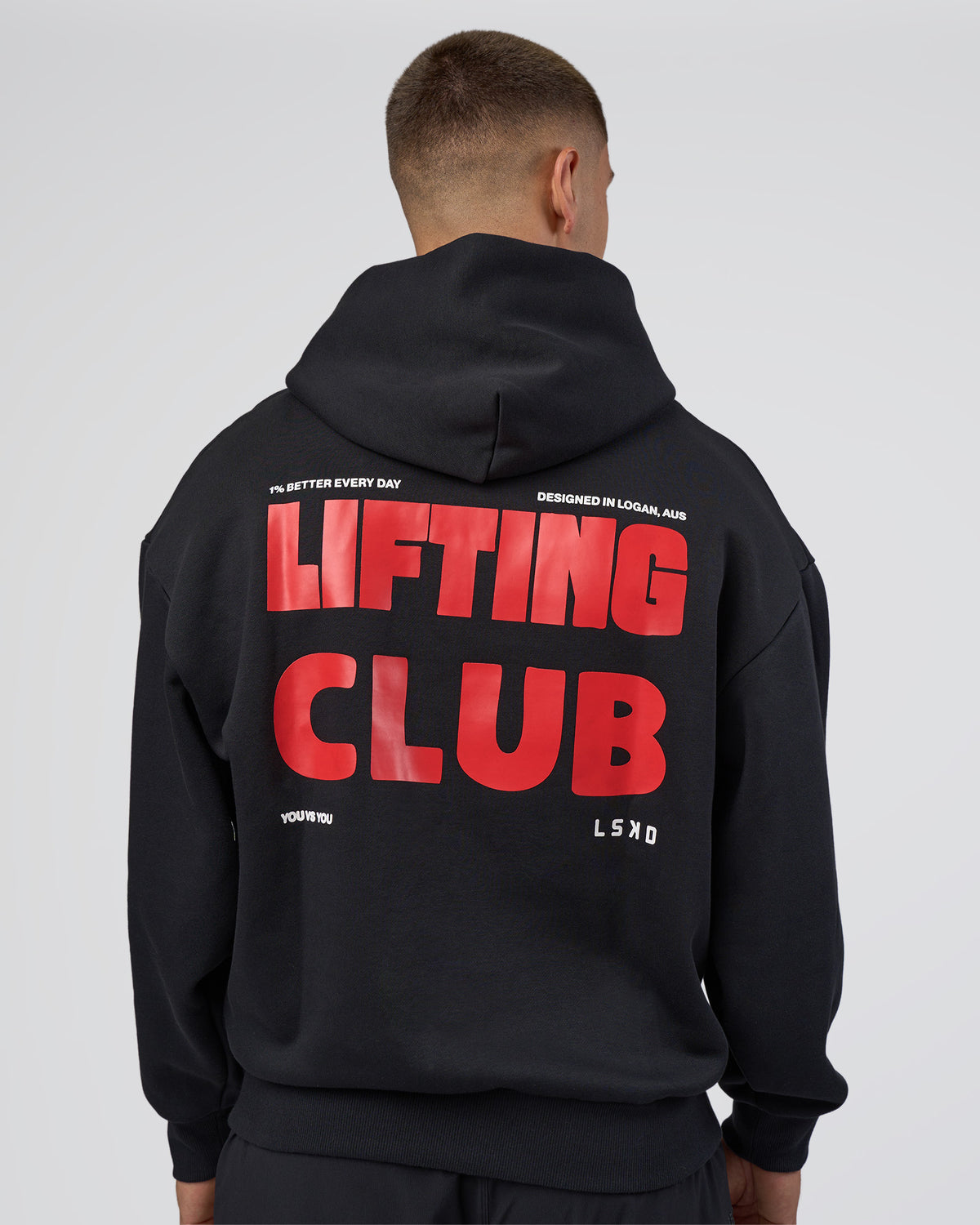 Man wearing Lifting Unisex Oversized Hoodie - Black-Flame| Model:Nikola | Size:L