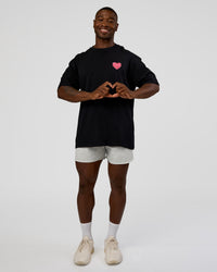 Man wearing Love the Journey FLXCotton Oversized Tee - Black-Flame | Model:Sam | Size:L | Thumbnail Index: 6
