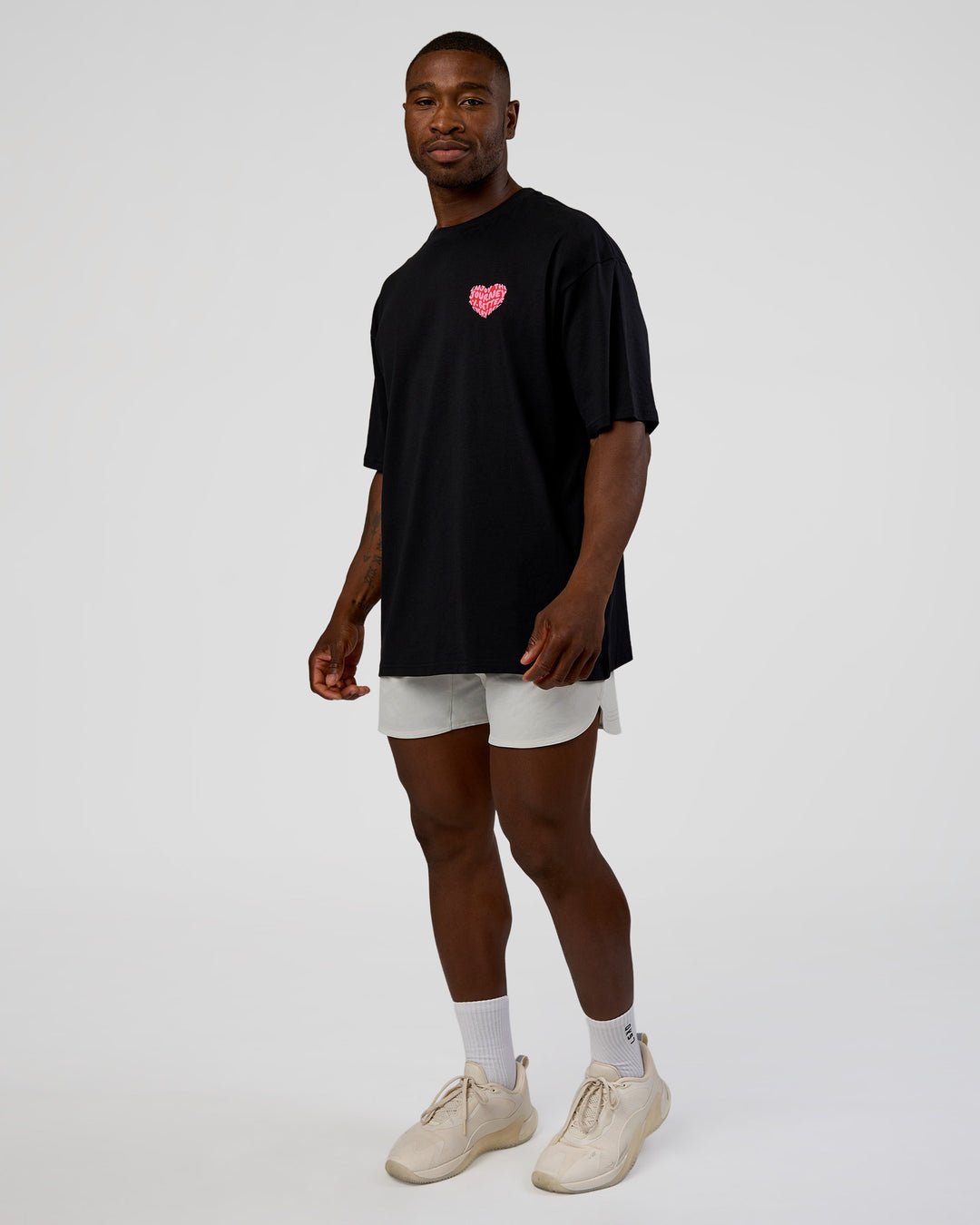 Man wearing Love the Journey FLXCotton Oversized Tee - Black-Flame | Model:Sam | Size:L - view 9