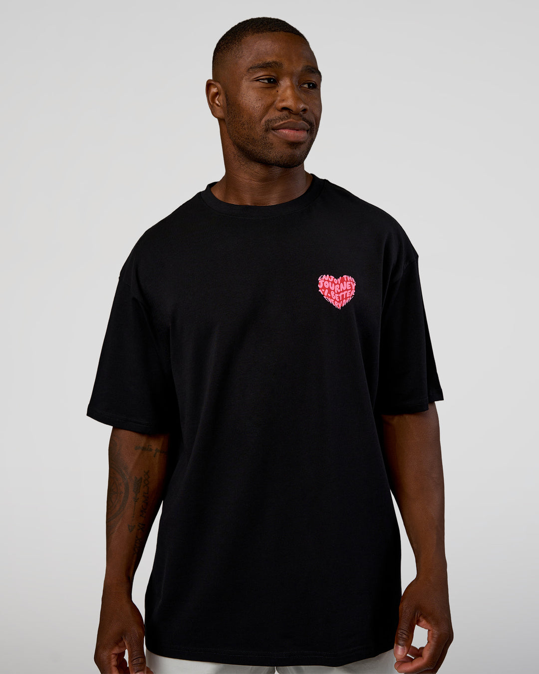 Man wearing Love the Journey FLXCotton Oversized Tee - Black-Flame | Model:Sam | Size:L - view 3