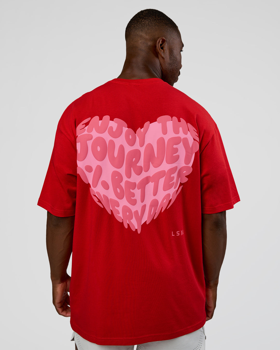 Man wearing Love the Journey FLXCotton Oversized Tee - Flame-Candy Pink | Model:Sam | Size:L - view 4