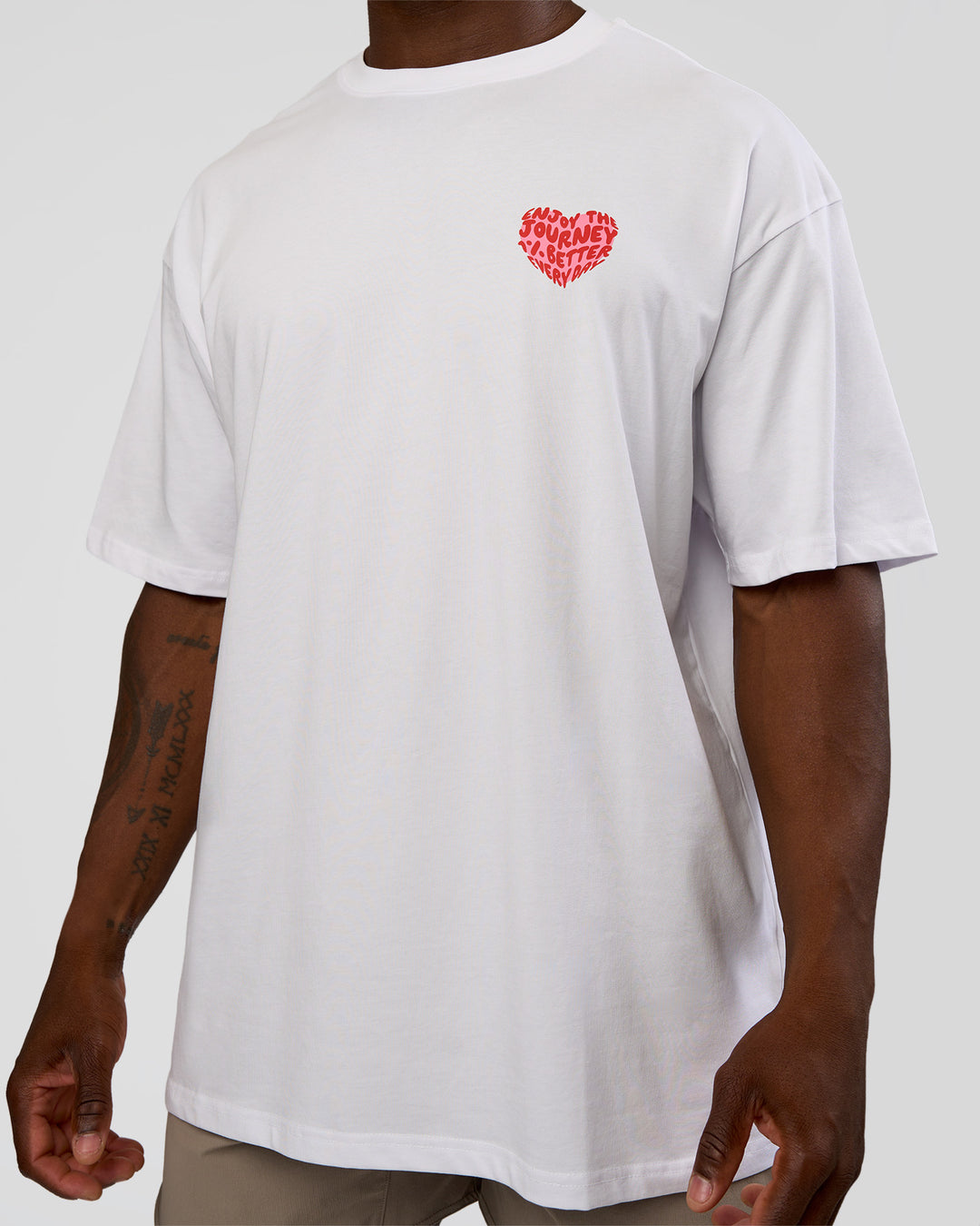 Man wearing Love the Journey FLXCotton Oversized Tee - White-Candy Pink | Model:Sam | Size:L - view 8