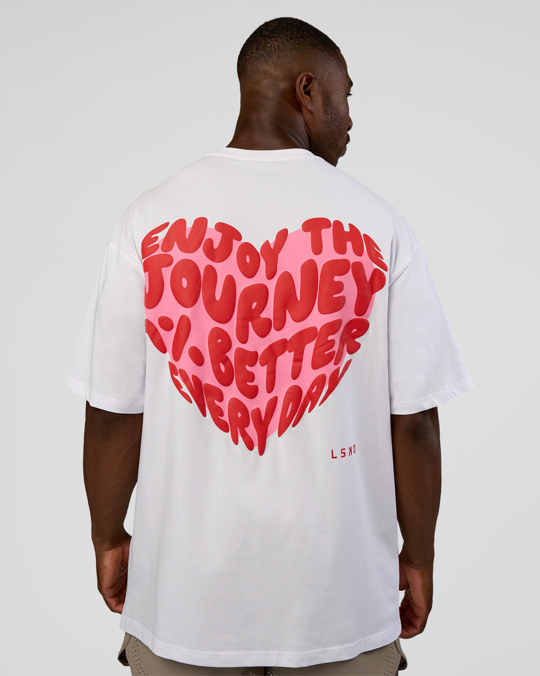 Man wearing Love the Journey FLXCotton Oversized Tee - White-Candy Pink | Model:Sam | Size:L - view 11