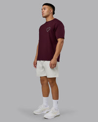 Man wearing Love The Process FLXCotton Oversize Tee - Cherry Lacquer-Shale Beige | Model:Kaelyb | Size:L | Thumbnail Index: 6