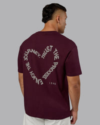 Man wearing Love The Process FLXCotton Oversize Tee - Cherry Lacquer-Shale Beige | Model:Kaelyb | Size:L | Thumbnail Index: 9