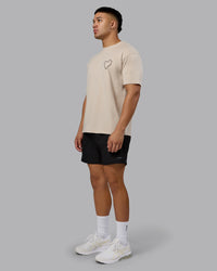 Man wearing Love The Process FLXCotton Oversize Tee - Shale Beige-Choc | Model:Kaelyb | Size:L | Thumbnail Index: 9