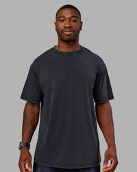 Man wearing Love The Run FLXCotton Tee Oversize - Black Washed-Circular Grey | Model:Sam | Size:L | Thumbnail Index: 3