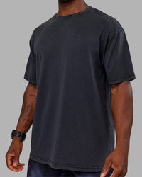 Man wearing Love The Run FLXCotton Tee Oversize - Black Washed-Circular Grey | Model:Sam | Size:L | Thumbnail Index: 9