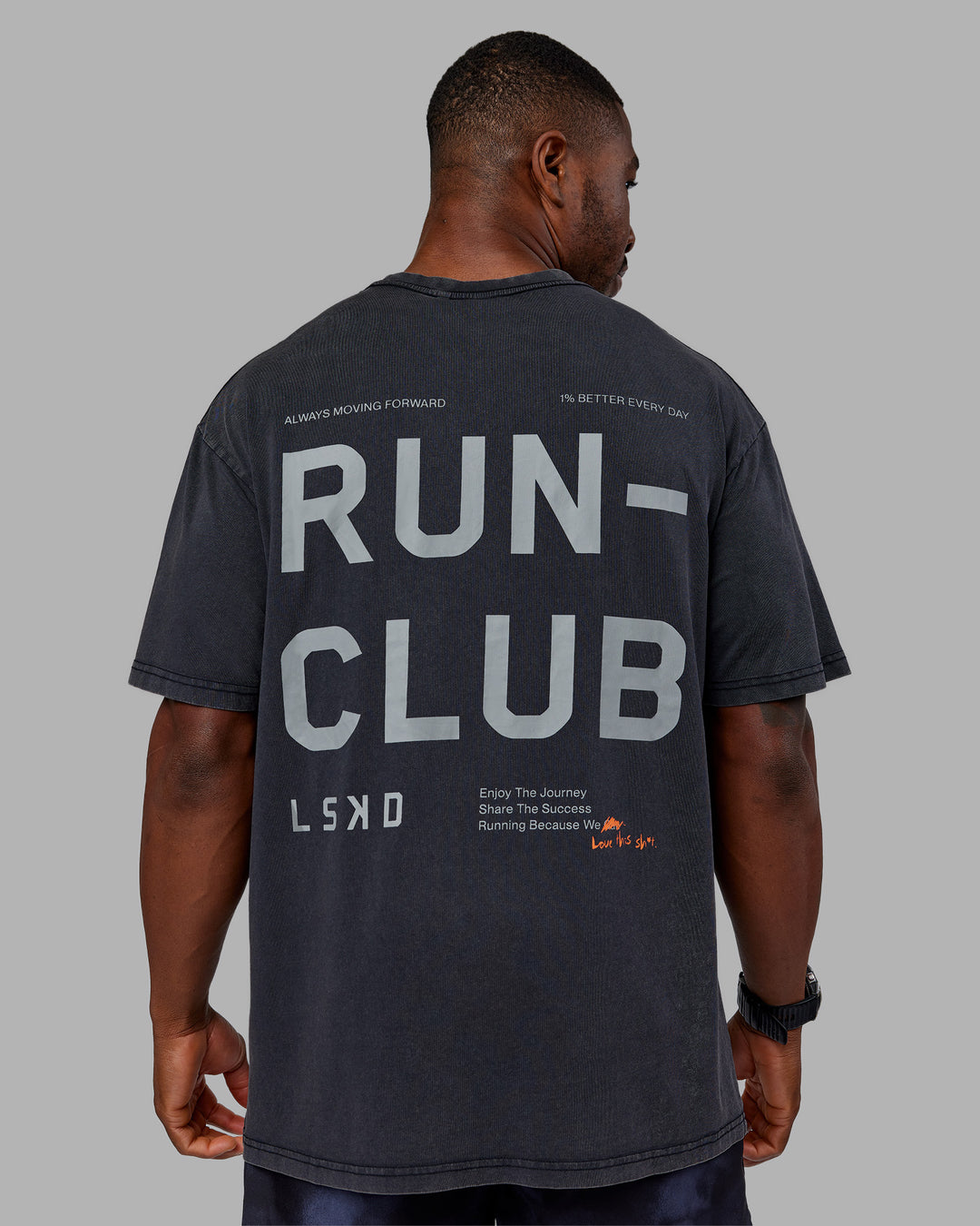 Man wearing Love The Run FLXCotton Tee Oversize - Black Washed-Circular Grey | Model:Sam | Size:L - view 2