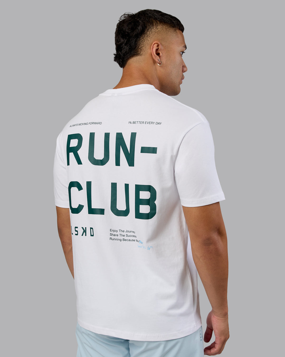 Man wearing Love The Run FLXCotton Tee Oversize - White-Dark Moss | Model:Kaelyb | Size:L - view 2