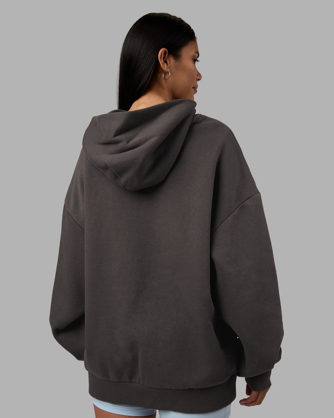 Woman wearing MVP Oversized Hoodie - Dark Storm | Model:Rhiley | Size:L - view 9