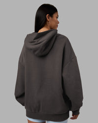 Woman wearing MVP Oversized Hoodie - Dark Storm | Model:Rhiley | Size:L | Thumbnail Index: 8