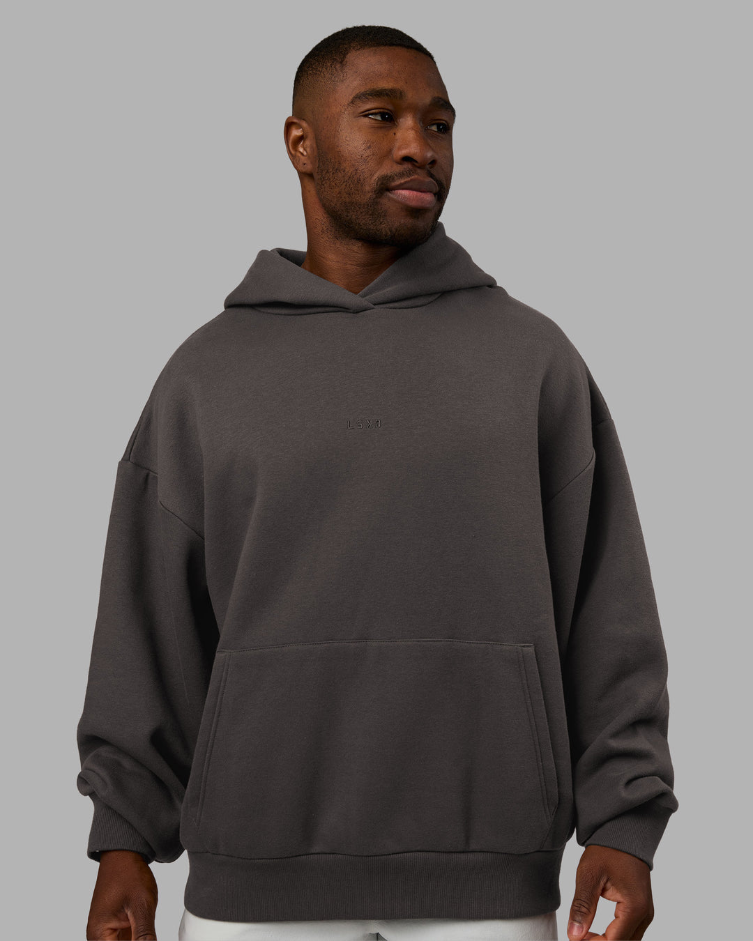 Man wearing MVP Oversized Hoodie - Dark Storm | Model:Sam | Size:L - view 2