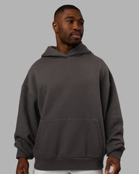 Man wearing MVP Oversized Hoodie - Dark Storm | Model:Sam | Size:L | Thumbnail Index: 1