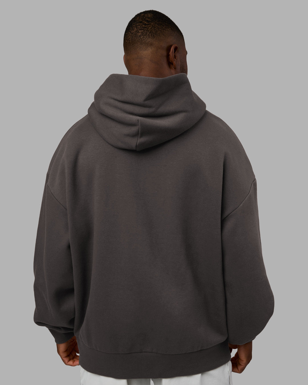 Man wearing MVP Oversized Hoodie - Dark Storm | Model:Sam | Size:L - view 4