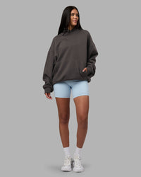Woman wearing MVP Oversized Hoodie - Dark Storm | Model:Rhiley | Size:L | Thumbnail Index: 4