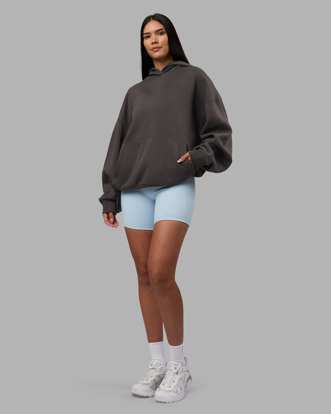 Woman wearing MVP Oversized Hoodie - Dark Storm | Model:Rhiley | Size:L - view 11