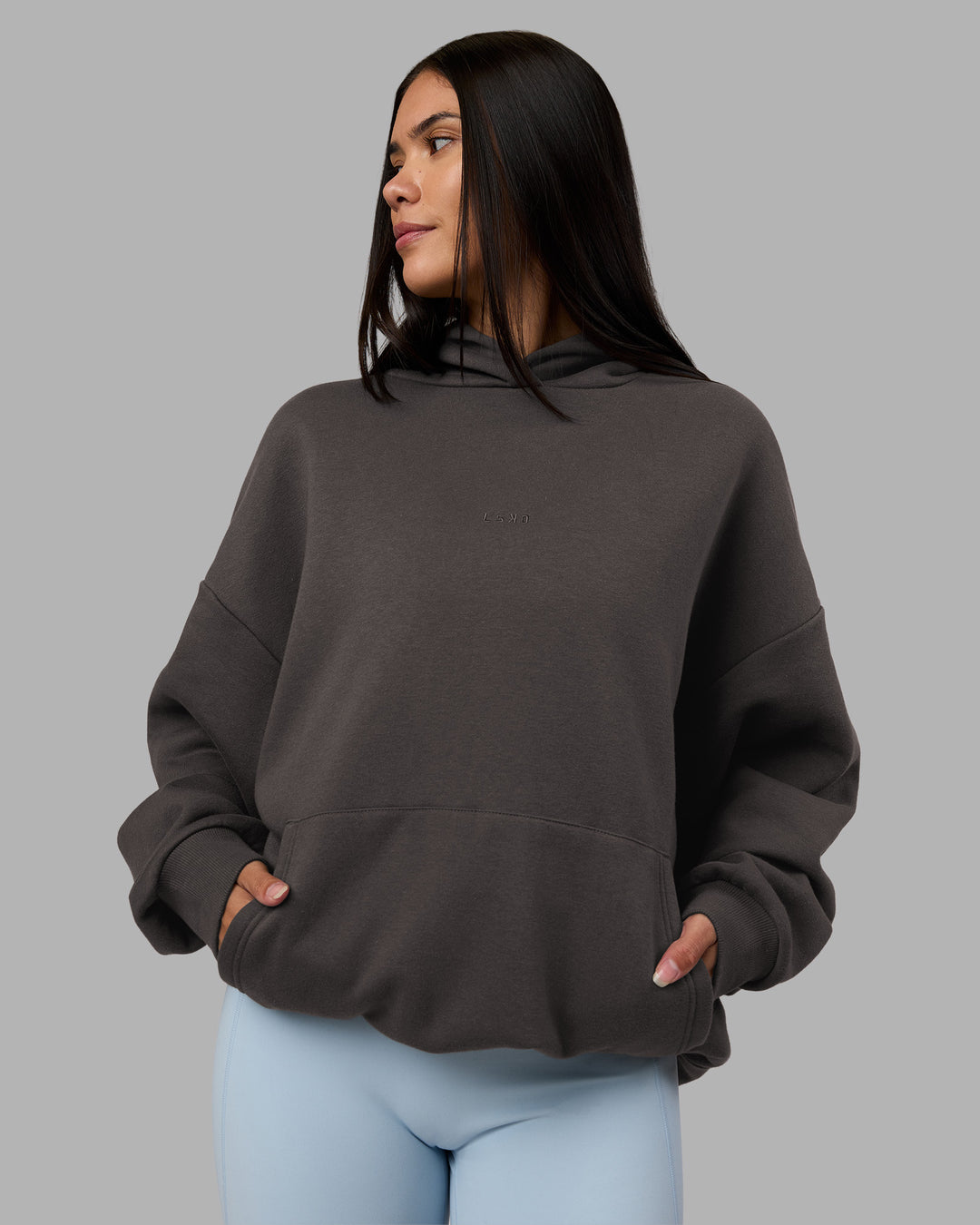 Woman wearing MVP Oversized Hoodie - Dark Storm | Model:Rhiley | Size:L - view 3