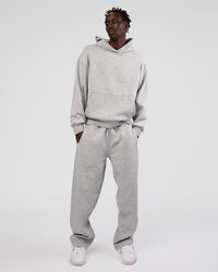 Man wearing MVP Oversized Hoodie - Light Grey Marl | Model:Okello | Size:L | Thumbnail Index: 1