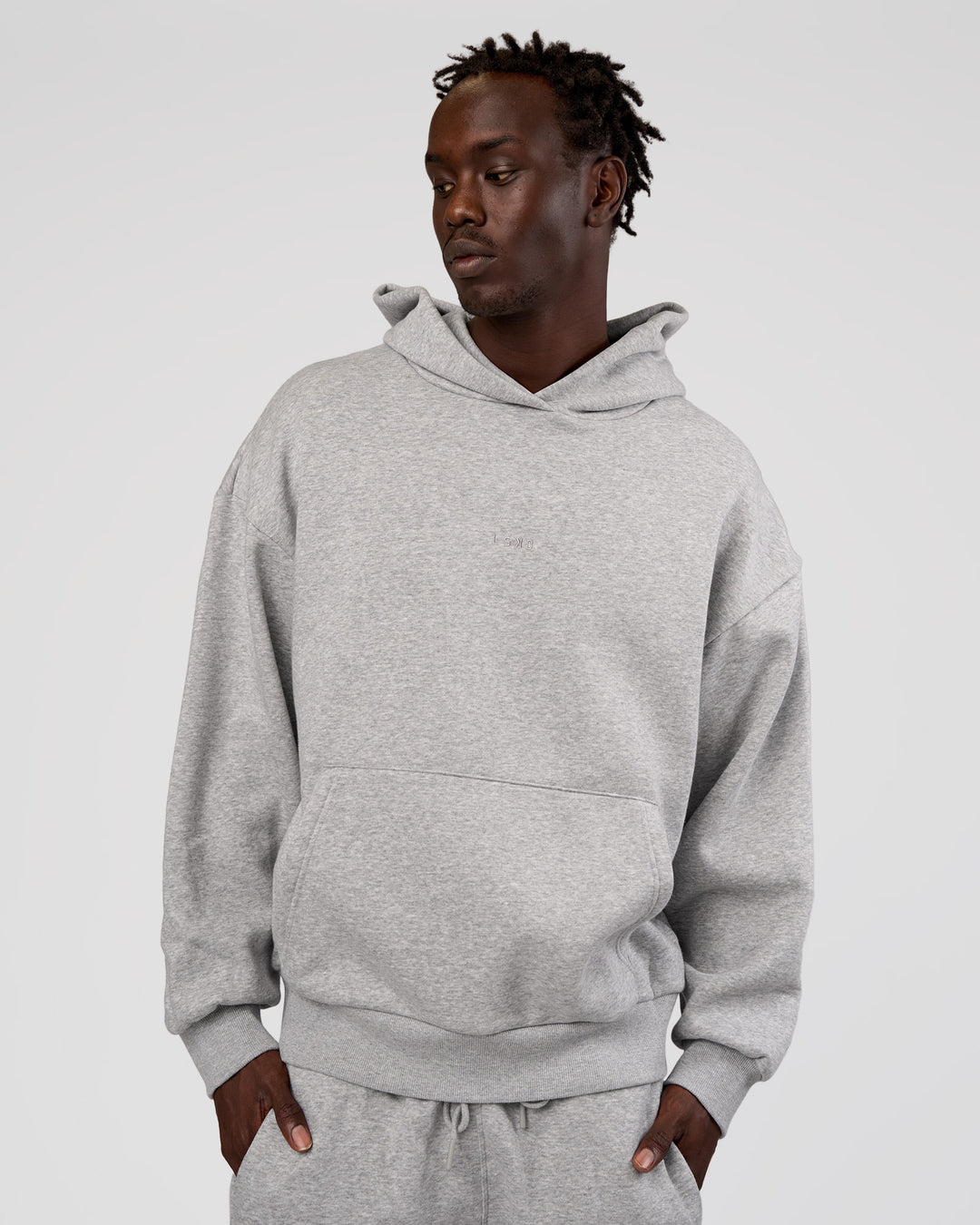 Man wearing MVP Oversized Hoodie - Light Grey Marl | Model:Okello | Size:L - view 8