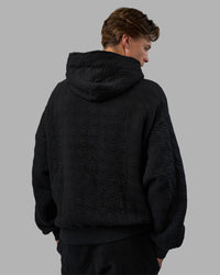 Man wearing MVP Quilted Oversized Hoodie - Black-Geometric | Model:Brandon | Size:L | Thumbnail Index: 6
