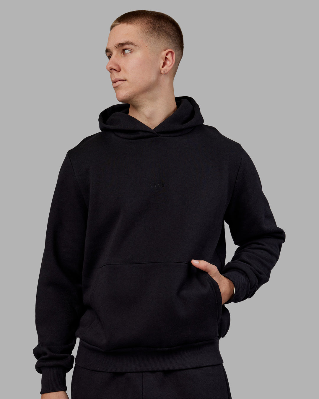 Man wearing MVP Regular Fit Hoodie - Black | Model:Tom | Size:L - view 1