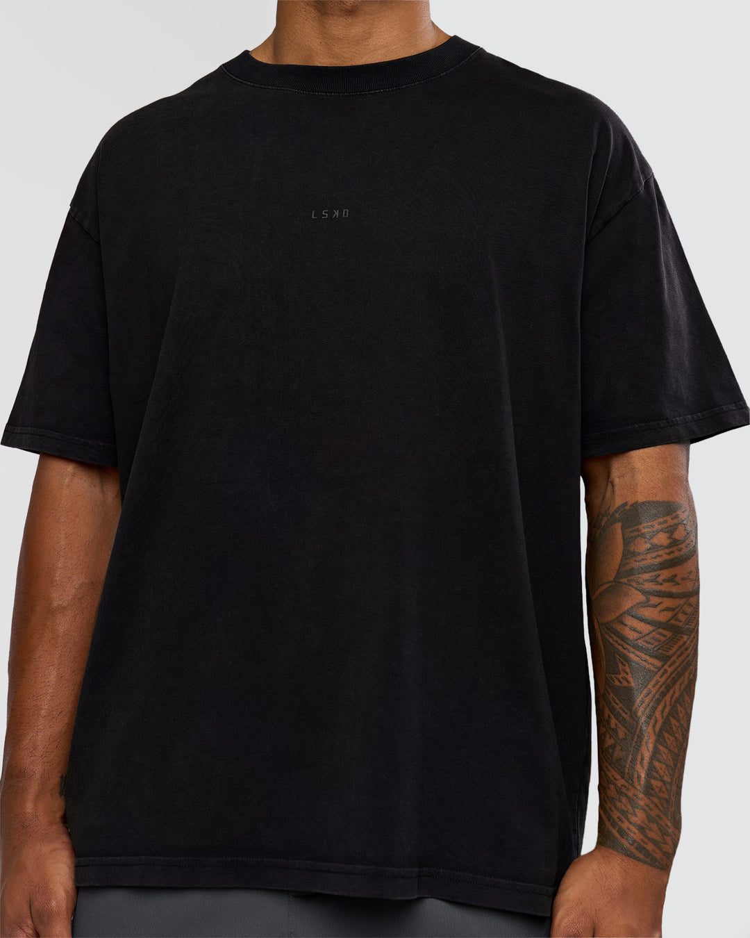 Man wearing Memory in Motion Heavyweight Oversized Tee - Black Washed | Model:Xav | Size:L - view 7