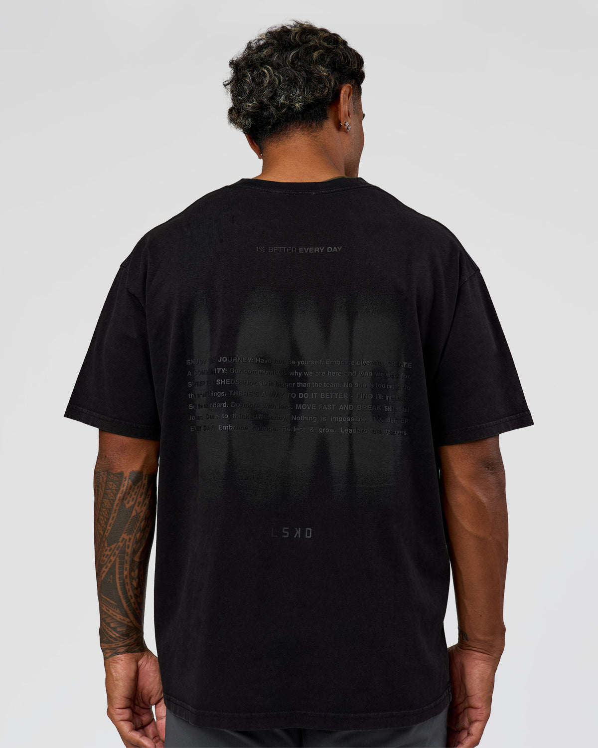 Man wearing Memory in Motion Heavyweight Oversized Tee - Black Washed | Model:Xav | Size:L