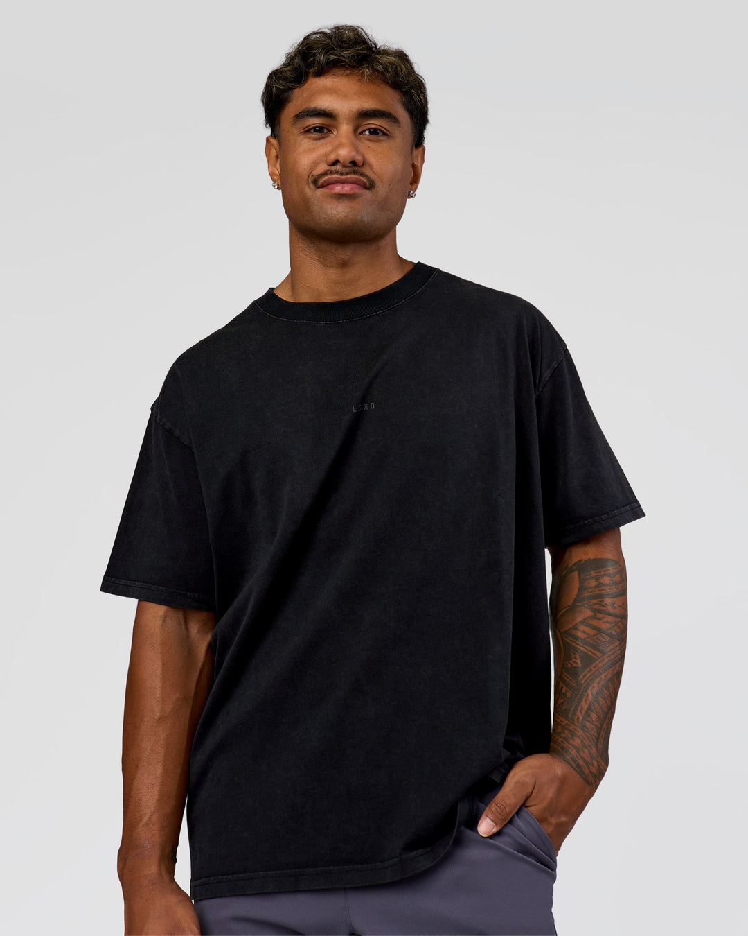Man wearing Memory in Motion Heavyweight Oversized Tee - Black Washed | Model:Xav | Size:L - view 3