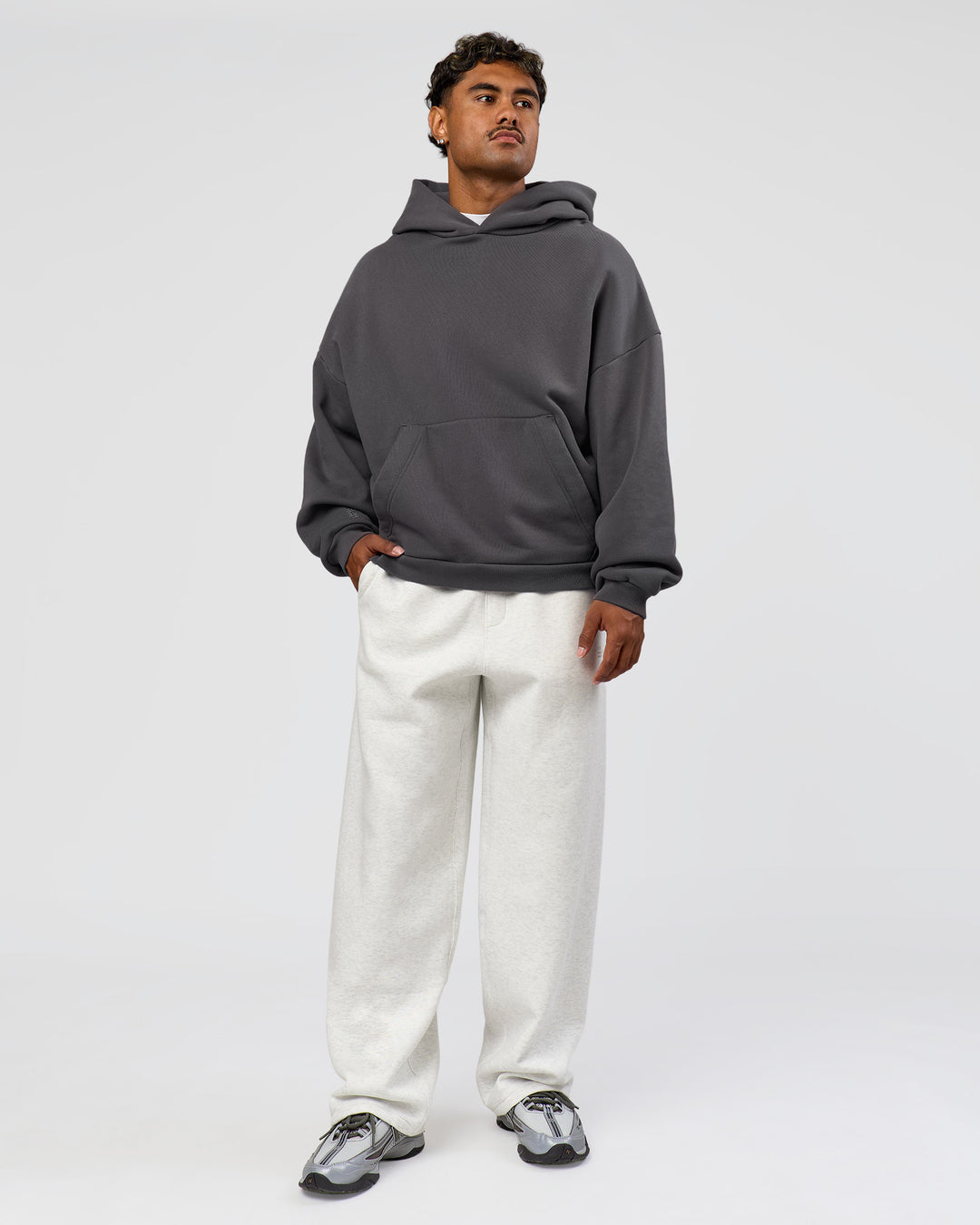 Man wearing Memory In Motion Ultra Heavyweight Washed Hoodie - Dark Storm Washed | Model:Xav | Size:L - view 11